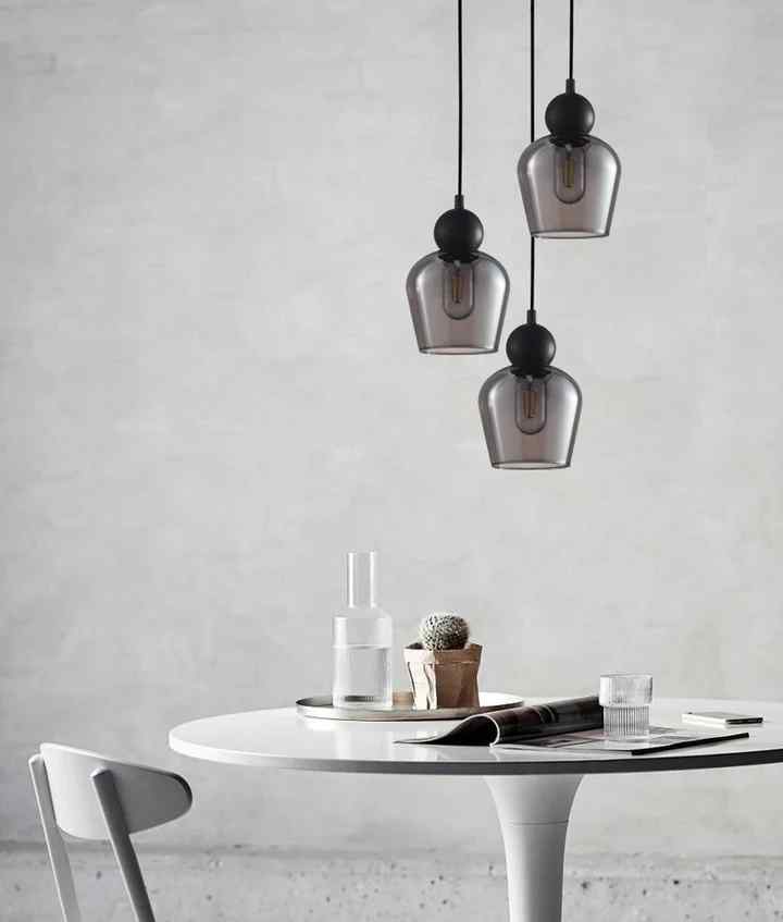 CLA CHAMPAN: Interior Bronze Amber / Smokey Black Glass Ellipse Multiple Round Base Pendant Lights